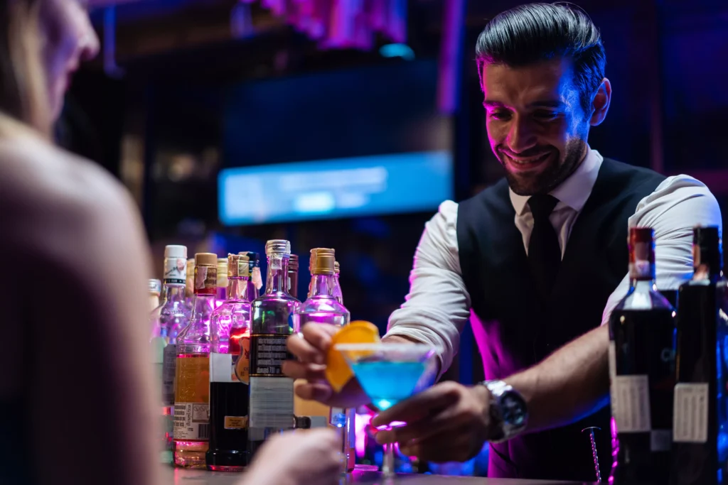 People socialising in a night-time venue