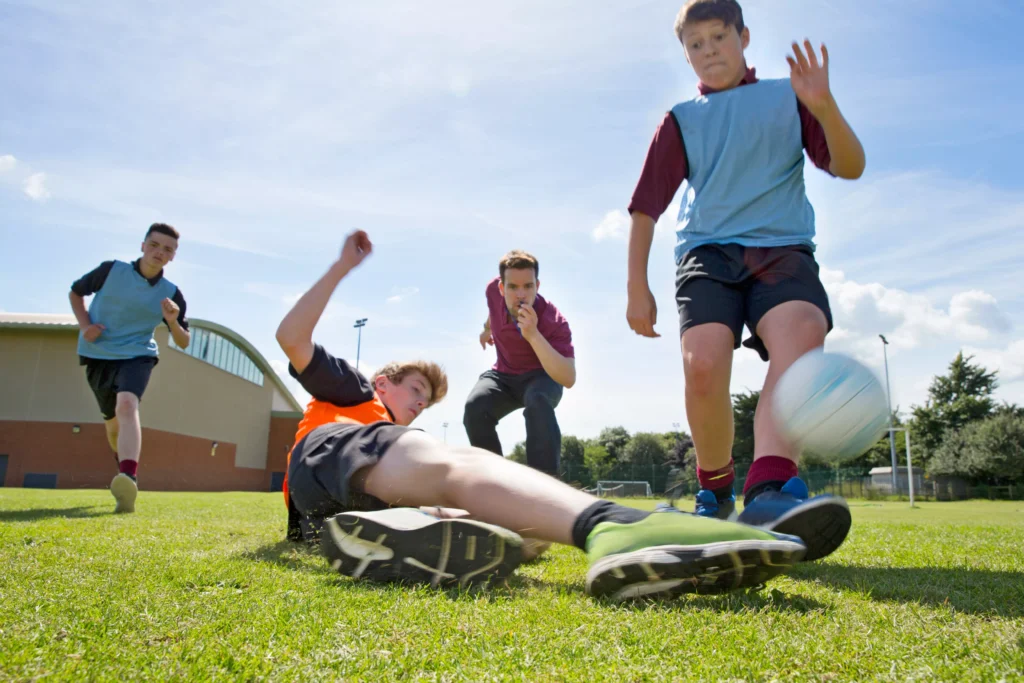 Young people taking part in a supervised sports activity