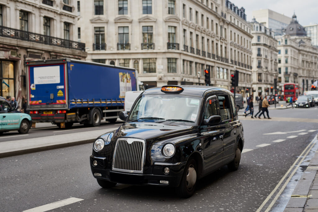 Taxi driving through a city